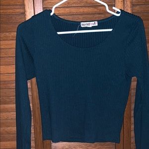 Ribbed long sleeve teal top.